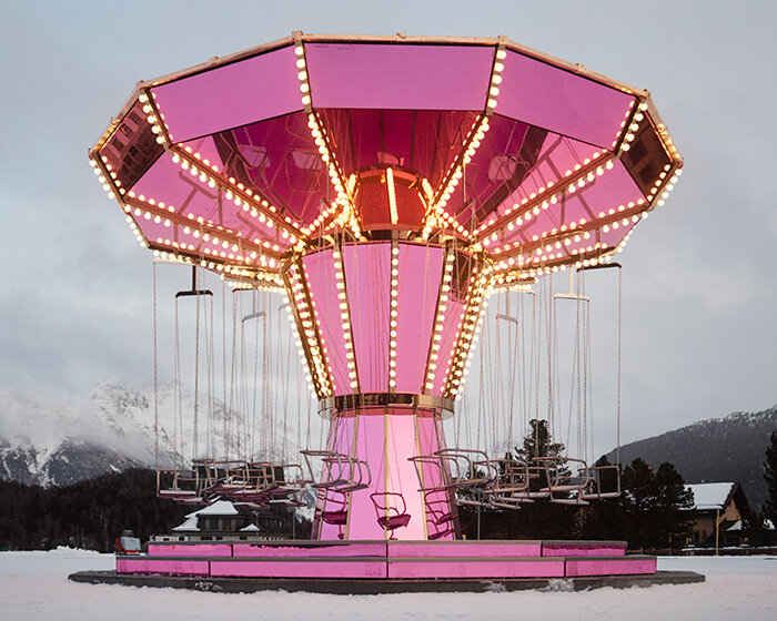 carsten höller's pink mirrored carousel slows rotation to stretch time in the alps